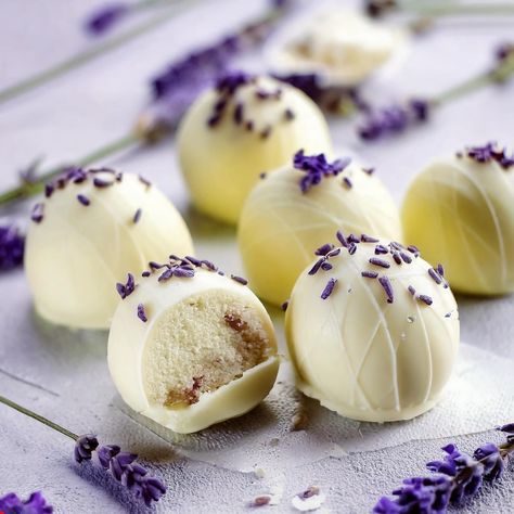 🍯💜 Honey Lavender White Chocolate Truffles 💜🍯 Indulge in these delightful Honey Lavender White Chocolate Truffles, a perfect blend of sweet and floral flavors. These truffles are easy to make and are an elegant treat for any occasion! Ingredients: 1 cup white chocolate chips 1/2 cup heavy cream 1 tbsp honey 1 tsp dried lavender flowers 1/2 cup crushed nuts (almonds or pistachios) Pinch of salt Directions: Heat the Cream: In a small saucepan, warm the heavy cream over medium heat (don’t le... Lavender Old Fashioned, Lavender White Hot Chocolate, Lavender White Chocolate Cookies, Honey Lavender White Chocolate Truffles, Lavender Chocolate, Lavender Honey Macarons, White Chocolate Truffles, Honey Lavender, Dried Lavender Flowers