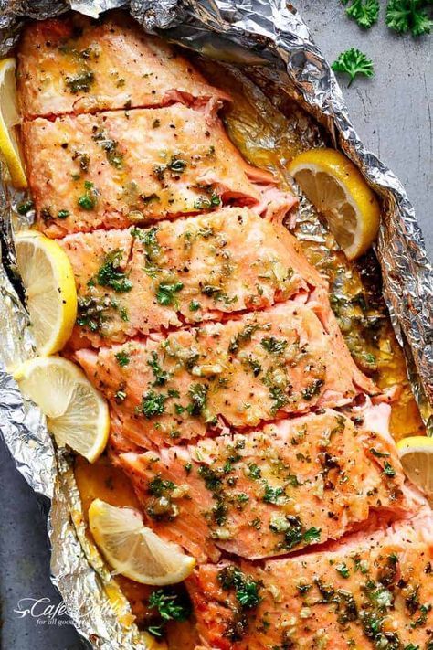 This Honey Garlic Butter Salmon In Foil recipe is an easy dinner to throw together on your busy weeknights or weekends! A delicious 4-ingredient honey garlic butter sauce is baked with a whole side of salmon, wrapped in foil, baked and broiled (or grilled) for that extra golden, crispy, caramelised and flakey finish! Honey Garlic Butter Salmon, Foil Wrapped Salmon, Garlic Butter Salmon In Foil, Side Of Salmon, Salmon In Foil Recipes, Salmon In Foil, Garlic Butter Salmon, Butter Salmon, Cafe Delites