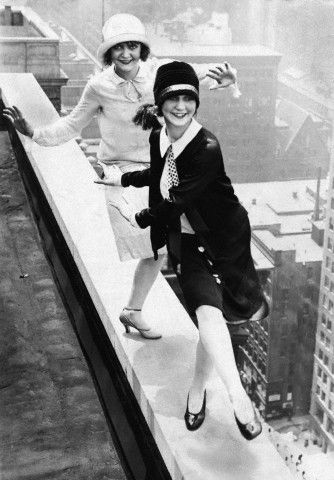 Flappers dancing on the rooftop above the city, 1920s Style Année 20, Flapper Girls, Roaring 1920s, 1920s Photos, Louise Brooks, Flapper Girl, Black And White Photograph, 20s Fashion, 1920s Flapper