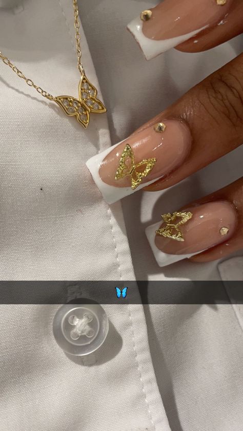 Gold Butterfly Acrylic Nails, Butterfly Nails Gold, White French Tip With Gold Charms, French Tips With Gold Charms, White And Gold Butterfly Nails, Nails With Gold Butterflies, Nails With Butterfly Charms, Nail Inspo Butterfly, Butterfly Nails White