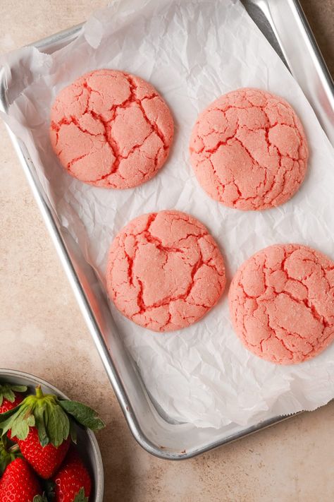 Make Strawberry Cake Mix Cookies with just three simple ingredients! Mix cake mix, eggs and oil to bake up soft and chewy strawberry cookies. Pink Strawberry Cookies, Strawberry Cake Cookies Recipe, Colorful Cookies Recipes, Strawberry Cookies From Cake Mix Recipes, Cookies Out Of Cake Mix Boxes, Strawberry Cake Mix Ideas, Strawberry Crinkle Cookies, Strawberry Cake Cookies, Strawberry Cake Mix Cookies