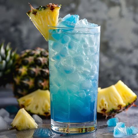 🏖️ Beach Water: Dive into tropical blue waters! #BeachWaterCocktail Beach Water Ingredients: Coconut rum (1 oz (30 ml)) Blue Curaçao (1 oz (30 ml)) Pineapple juice (2 oz (60 ml)) Lemon-lime soda (to top) Instructions: Mix coconut rum, Blue Curaçao, and pineapple juice in a shaker with ice. Shake well and pour into a glass with ice. Top with lemon-lime soda. 🌊🥥 Experience the ocean breeze with our Beach Water cocktail! #TropicalTaste Blue Curacao Drinks Coconut Rum, Blue Coconut Cocktail, Blue Calypso Alcohol Drink, Blue Hawaii Mocktail Drink, Blue Hawaii Drink, Twisted Recipes, Lemon Lime Soda, Blue Curacao, Tropical Blue