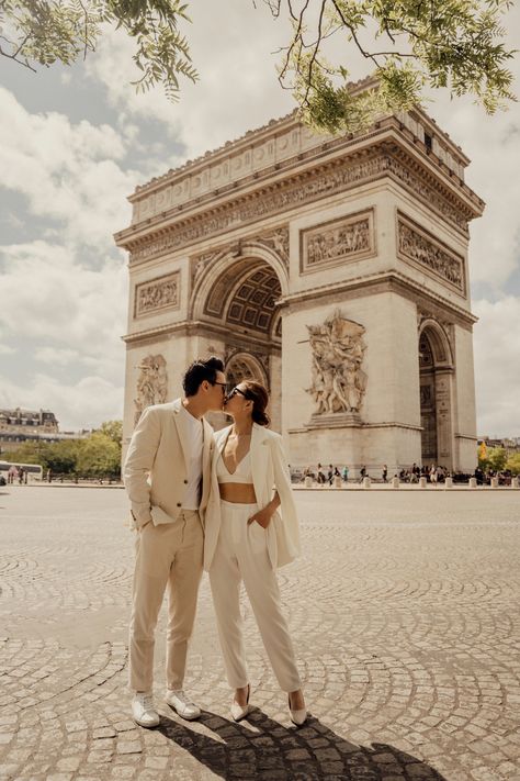 Couple posing in front of the Triumphal Arch Couple Poses In Paris, Italian Couple Photoshoot, Paris Men Aesthetic, Milan Couple Photos, Paris Photoshoot Ideas Couples, Europe Engagement Photos, Couple Photoshoot Paris, Paris Couple Aesthetic, Paris Couple Photoshoot