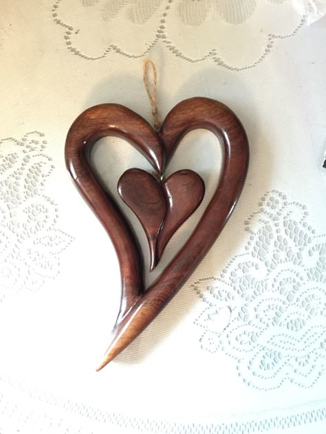 Walnut wood heart in heart Carving To Carve A Fae Heart, Butterfly Wood Carving, Carved Hearts In Wood, Wooden Heart Pendant, Tre Kunst, Wooden Jewelery, Dremel Crafts, Coconut Shell Crafts, Antler Crafts