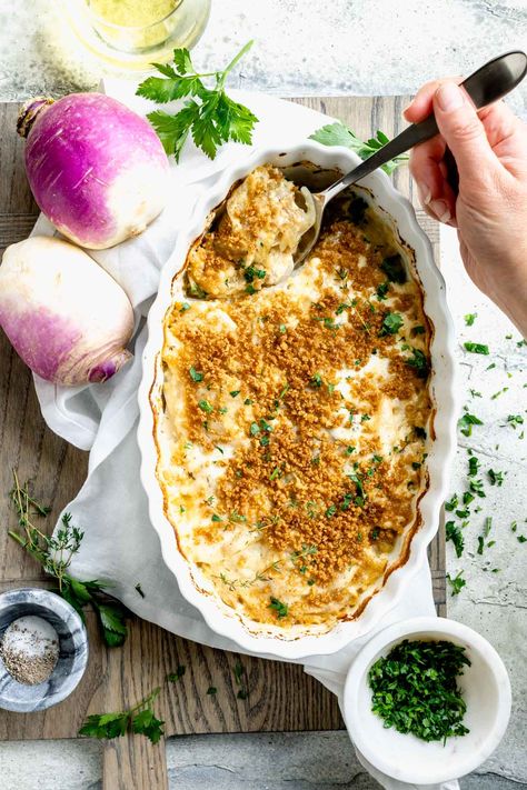 Learn how to make the best Turnip Casserole for an elegant weeknight or holiday side dish. This easy to follow recipe is ridiculously simply yet insanely delicious. Layered with savory caramelized onions, creamy béchamel sauce and Parmesan cheese, this is an effortless recipe that you need to keep in your repertoire! Get the best easy-to-make turnip casserole at www.healthyseasonalrecipes.com! Turnip Casserole, Green Casserole, White Turnip, Easy Easter Dinner, Turnip Recipes, Maple Glazed Carrots, Dinner Casserole Recipes, Glazed Carrots, Holiday Side Dishes