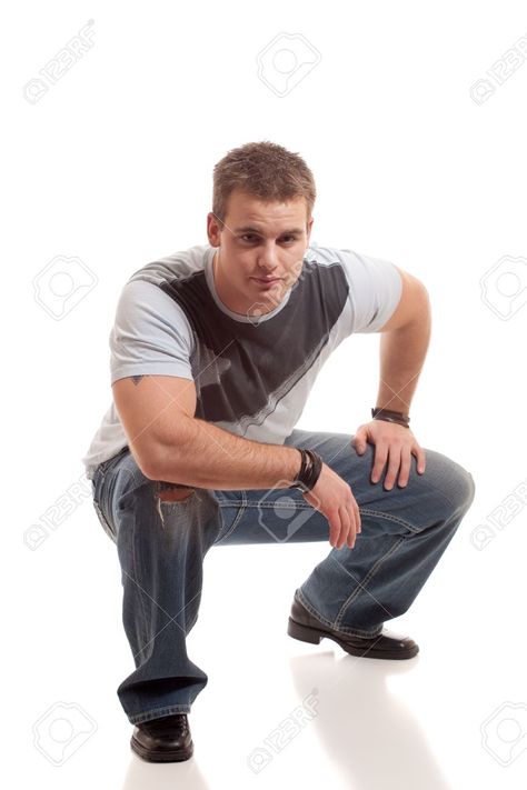 Casual Man On White Stock Photo, Picture And Royalty Free Image. Image 8641918. Man Squatting Reference, Squat Sitting Pose, Squatting Pose, Squat Pose, Sitting Pose, Casual Man, Sitting Poses, White Stock, Banner Printing