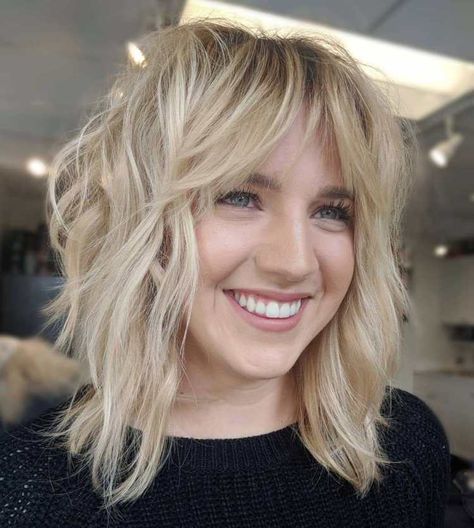 Voluminous Wispy Blonde Shag Interesting Blonde Hair Color, Textured Medium Length Hair With Bangs, Rocker Shag Haircut, Short Blonde Shag, Fine Hair Shag, Blonde Shag Haircut, Thick Bob Haircut, Modern Shag Haircuts, Blonde Shag