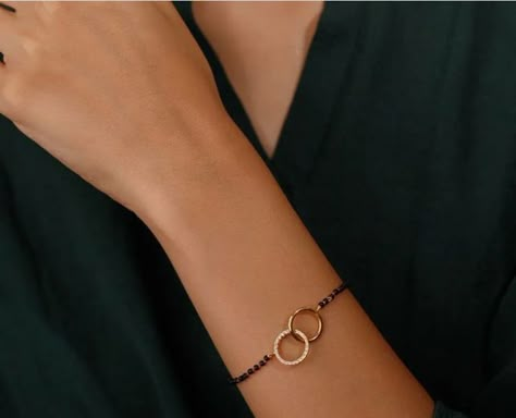 Women Bracelet designs Mangalsutra Bracelet Design, Stylish Mangalsutra, Bracelet Mangalsutra, Hand Mangalsutra, Black Beads Bracelet, Buddhism Wallpaper, Simple Necklace Designs, Mangalsutra Bracelet, Gold Bracelet Simple