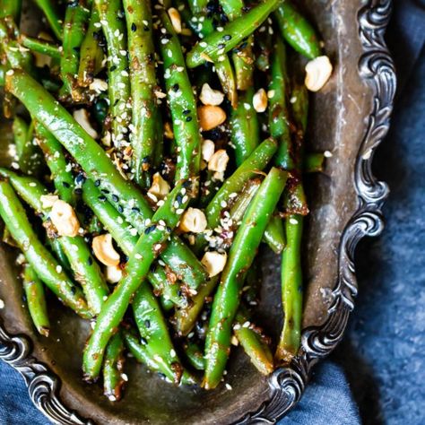 Thai Green Beans made on the stovetop with a delicious easy peanut sauce. These will be your new favorite way to eat green beans! #greenbeans #peanutsauce #sidedish #vegetarian #veganrecipe #glutenfreerecipe Thai Green Beans, Thai Side Dishes, Easy Peanut Sauce, Ambitious Kitchen, Eat Veggies, Fresh Green Beans, Green Bean Recipes, Asian Foods, Healthy Sides