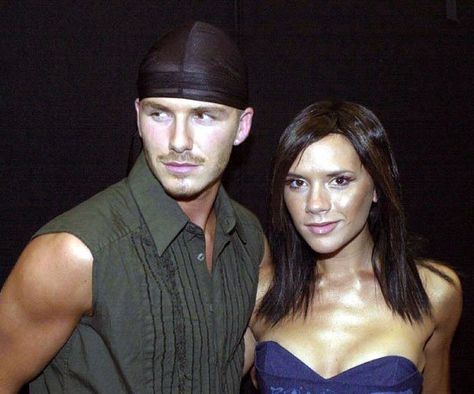 Pin for Later: 39 Pictures That Prove David and Victoria Beckham's Love Just Won't Quit  Shortly after their first anniversary, the couple went to a party in London in July 2000. Posh And Becks, Troy Bolton, Victoria And David, David And Victoria Beckham, British Fashion Awards, Joe Manganiello, Amal Clooney, Patrick Dempsey, Mtv Movie Awards