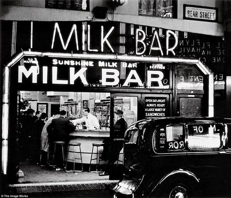 Forget the lively bars and nightclubs of today, back in the 1930s Milk Bars were all the rage. This image shows Sunshine Milk Bar in Bear Street, central London in 1936. Milk bars grew in popularity during the 1930s, when public health became an important social issue, as they sold exotic milk-based drinks for adults.  Photo credit: The Image Works — in London, United Kingdom. Bar Inspiration, Nostalgic Images, London History, Piccadilly Circus, Swinging Sixties, London Bars, Milk Bar, Leicester Square, Diy Bench