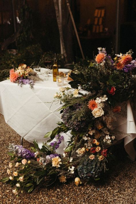 Moody Florals for Wedding Tables: Create a Dramatic and Elegant Setting 🌹🌙  Transform your wedding tables with moody, rich floral arrangements. Embrace deep hues and lush textures to set a dramatic and sophisticated tone for your celebration. Dark Moody Fall Wedding, Jewel Tone Floral Arrangements, Moody Spring Wedding, Florals For Wedding, Moody Florals, Pagan Wedding, Romantic Wedding Flowers, January Wedding, Ball Wedding