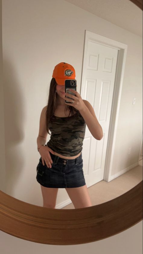 camo tank top, mini denim skirt, baseball cap, outfits, fits, inspo, spring/summer outfit ideas Camo Tank Top Outfit, Camo Top Outfit, Camo Outfit Ideas, Baseball Cap Outfits, Halter Tops Outfit, Thrift Flip Ideas, Camo Tank Top, Flip Ideas, Camo Skirt