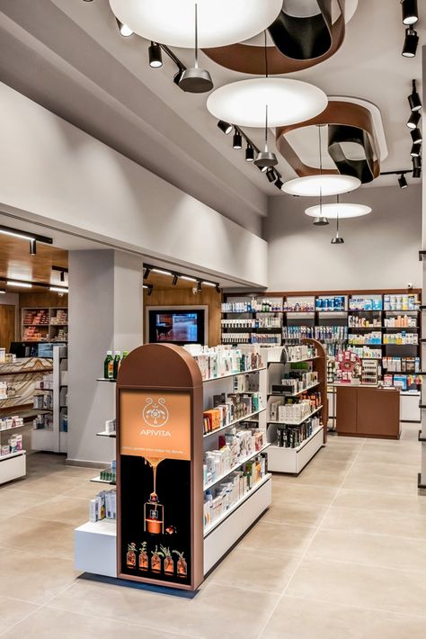 Chania pharmacy Store Counter Design, Wellness Center Design, Pharmacy Decor, Pharmacy Store, Pharmacy Design, Stationary Shop, Showroom Interior Design, Shelving Design, Counter Design