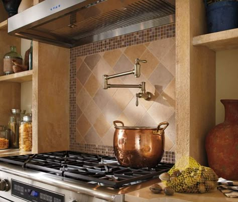 6 Design Ideas For Your Range Backsplash | Stock Cabinet Express Kitchen Cabinet Color Ideas, Pot Filler Kitchen, Wall Faucet, Brass Kitchen Faucet, Pot Filler Faucet, Pot Filler, Brass Kitchen, Delta Faucets, Champagne Bronze