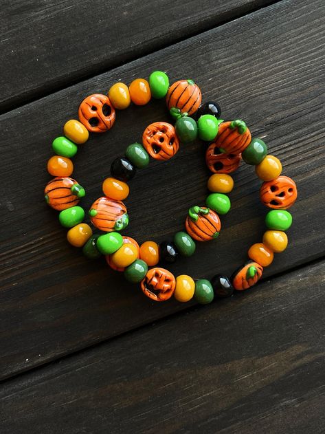 One Clay stretch bracelet, handmade polymer clay beaded stretch bracelet, pumpkin bracelet, pumpkin bead bracelet, Halloween beads bracelet by NanaSunsCreations on Etsy Halloween Polymer Clay Bracelets, Pumpkin Bracelet, Pumpkin Bead, Polymer Clay Bracelet, Halloween Beads, Clay Bracelet, Extreme Heat, Polymer Clay Beads, Handmade Bracelet