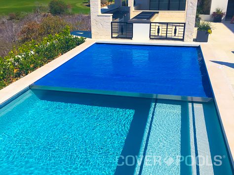 @coverpools Cover of the Month: Vision Pools International visionpoolscabo.com Royal Blue Automatic Swimming Pool Cover with hidden leading edge Pools With Covers, Pool Cover Ideas, Hidden Swimming Pools, Retractable Pool Cover, Luxury Pools Indoor, Swimming Pool Cover, Swimming Pool Enclosures, Hidden Pool, Rectangular Swimming Pools