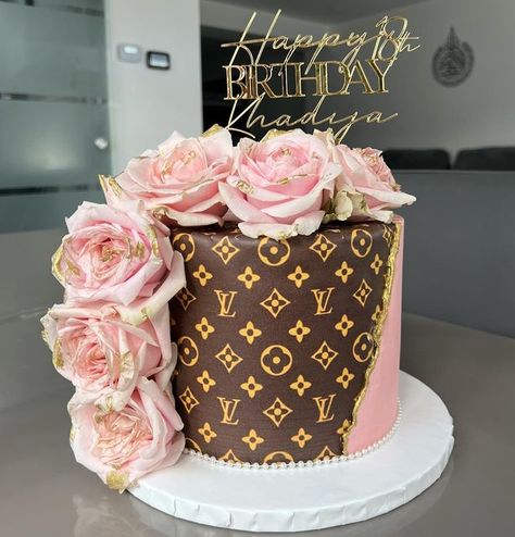 Dessert Location on Instagram: "Lv cake🌸 In love with this colour combo🤩 Acrylic topper by @maluxuryacrylics Edible print by @topperlicious_luton Inspired by @z_rcakes DM @dessertlocation._ for orders and enquiries📩 * * * #lvcake #birthdaycake #yummy #chocolatecake #gold #happybirthday #desserts #luton #birthdaygirl #explorerpage #caketutorial #gold #luxurycupcakes #luxurycake #cake #desserts #birthday #birthdayboy #gift #birthdaygift #customisedgifts #desserts #baker #luton #cakesofinsta Boujie Birthday Cake, Lv Cake Designs Birthday, Lv Birthday Cake For Women, Designer Cakes Birthday, Pink Louis Vuitton Cake, Designer Cakes For Women, Extravagant Cakes, Designer Birthday Cakes For Women, Designer Birthday Cake