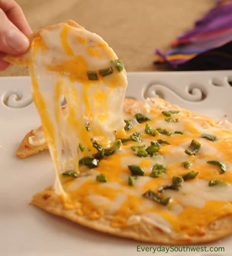 What's a Cheese Crisp? A crispy flour tortilla smothered in melted cheese and any toppings you crave. Roasted green chiles are Arizona classic Cheese Crisp Recipe, Crisps Recipe, Authentic Mexican Recipes, Cheese Crisps, Mexican Cheese, Crisp Recipe, Mexican Foods, South Of The Border, Mexican Food Recipes Authentic