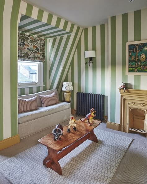 green and white striped wallpaper, kids playroom, childrens playroom, childrens snug, kids snug, yellow woodwork Green Stripe Nursery, Green Striped Wall, Painted Stripes On Wall, Striped Ceiling, Green Kids Rooms, Striped Nursery, Green Interior Design, Fun Nursery, Striped Room