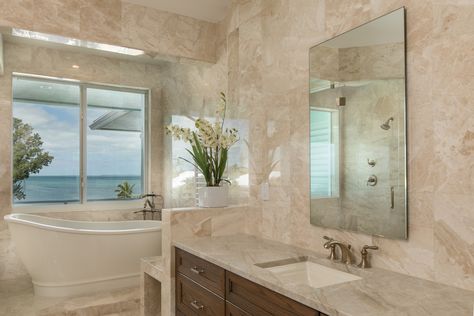 Taj Mahal Quartzite project using stone slabs by Primstones®, the Premier Stone Provider in South Florida with locations in Miami and West Palm Beach. #tajmahal #tajmahalquartzite #bathroom #bathroomdecor #naturalstonecountertop #naturalstoneflooring #naturalstone #bathroominspiration #interiordesign Taj Mahal Quartzite Bathroom, Taj Mahal Bathroom, Quartzite Bathroom, Marble Bathroom Ideas, Taj Mahal Quartzite Countertops, Best Countertops, Quartz Bathroom, Taj Mahal Quartzite, Quartz Tiles