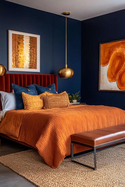 Ever notice how the most relaxing hotel rooms often feature deep, rich colors? Navy Blue Mustard Yellow Burnt Orange Bedroom, Navy And Burnt Orange Bedroom, Terracotta And Blue Bedroom, Blue And Burnt Orange Bedroom, Blue And Orange Bedroom Ideas, Burnt Orange Bedroom, Navy Blue Bedroom Ideas, Blue And Cream Bedroom, Tan Bedroom