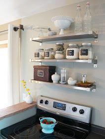 I get a lot of emails asking me about the open shelves above our stove.  It's usually some variation of: Do the shelves & acoutrements get ... Shelves In Small Kitchen, Shelves Above Stove, Grey Floating Shelves, Stove Installation, Kitchen Redo, House Renovation, Kitchen Shelves, Apartment Ideas, Country Kitchen