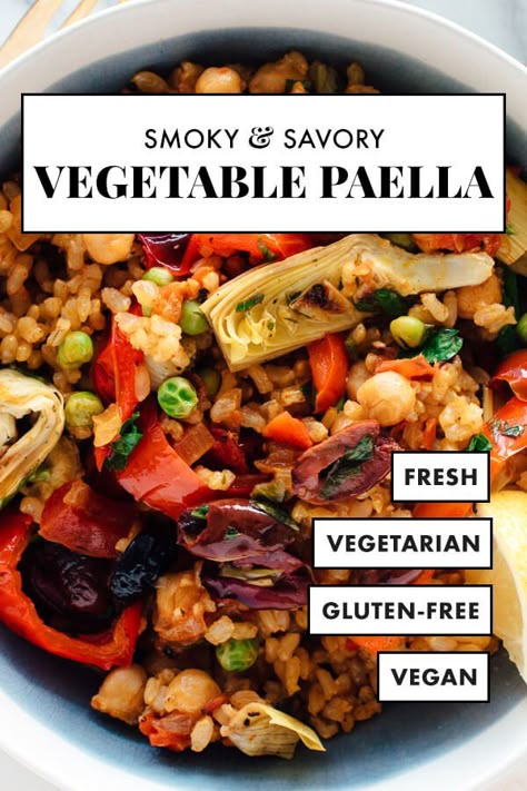 The BEST vegetable paella recipe! It’s loaded with vegetables, chickpeas, and savory spiced rice. This paella recipe is absolutely delicious and easy to make at home, too. It’s vegetarian, vegan and gluten free! #cookieandkate #paella #vegan #healthyrecipe #dinner Baked Risotto Recipes, Vegetable Paella Recipe, Vegetable Paella, Spiced Rice, Paella Recipe, Vegetarian Cookbook, Spanish Dishes, Risotto Recipes, Vegan And Gluten Free