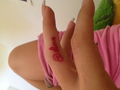 "Believe" tattoo on finger .. Pink ink OMG i was going to get this!!!!! Red Word Tattoo, Red Ink Tattoo Words, Believe Tattoo, Tattoo Word Fonts, Tattoo On Finger, Red Word, Believe Tattoos, Word Tattoo, Red Words