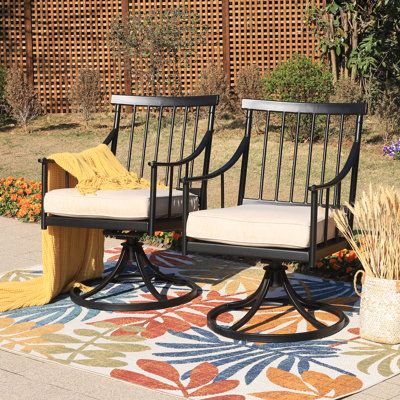 This set patio dining swivel chair completes your backyard seating ensemble while bringing a traditional air to your space. Each chair has a black steel frame with curved armrests and a classic slat-back design; the swivel system makes it free to seat any position. A thick seat cushion from a cotton and linen blend rests on top. It comes in a neutral beige hue to match a variety of color schemes. Welted edges add a tailored touch, while a polyester and foam fill provides ample support as you han Garden People, Traditional Patio, Seattle Homes, Backyard Seating, Black Steel Frame, Dining Armchair, Swivel Chairs, Patio Dining Chairs, Dining Chair Cushions