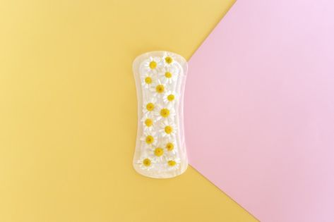 A sanitary pad with chamomile flowers on... | Premium Photo #Freepik #photo #certificate #woman #medical #white Sanitary Pads Product Photography, Sanitary Pads Photography, Sanitary Pads, Colorful Background, Chamomile Flowers, Yellow Background, Premium Photo, Blue Backgrounds, Photography Ideas