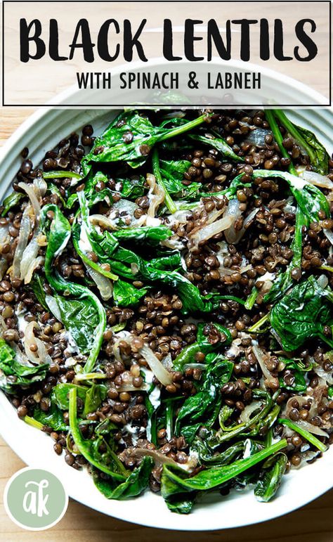 Black lentils: Do you know about them? They cook quickly AND they hold their shape! I love their texture and flavor. Here, they are mixed with sautéed onions and spinach. This dish is heavy on the vinegar, which adds bite and sweetness, and which lentils need. The best part about this? You serve it with something creamy like buratta or labneh, and the whole combination is just so good! #lentils #spinach #blacklentils #buratta #labneh #glutenfree #vegetarian French Green Lentils, Black Lentils, Turnip Greens, White Balsamic Vinegar, Beet Greens, Green Lentils, Midweek Meals, Lentil Recipes, Roasted Beets