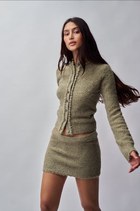 The Palmyra Knit Cardigan is crafted from textured boucle yarn that offers a soft, luxurious feel and a timeless look. Its relaxed fit and classic design make it perfect for layering and pairs back to the Palmyra Knit Mini Skirt. Fabrication: Brushed Boucle Sonali is wearing a size S and is 5'10" with a 31" bust, 35" hips, and 23" waist Cute Professional Outfits, Knit Mini Skirt, Boucle Knit, Perfect White Tee, Fasion Outfits, Cargo Skirt, Winter Trends, Solid & Striped, Professional Outfits