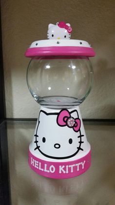 Terra Cotta Pot Gumball Machine, Hello Kitty Diy Crafts, Hello Kitty Gumball Machine, Hello Kitty Diy, Diy Terra Cotta Pots, Pot Painting Ideas, Diy Hello Kitty, Bubble Gum Machine, Terra Cotta Pot Crafts Diy