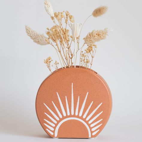 PRICES MAY VARY. Unique Vase with sun rays etched design. Funky and eclectic decoration sure to brighten up, and add color to any space. Holds pampas grass, fresh floral arrangements, small plants, and succulents Modern boho home decor. Elegant vase for dried florals to adorn the living room, shelf, dining, or table. Use as a pen holder on a desk, makeup brushes on a bathroom vanity, or hold incense or candles Drainage hole with removable plug, a great planting alternative to regular flower pots Bedroom Ideas Boho Chic, Cute Vintage Aesthetic, Cute Plant Pots, Bedroom Boho Decor, Small Flower Vases, Electric Bathroom, Home Decor Boho Chic, Boho Centerpiece, Sun Decor