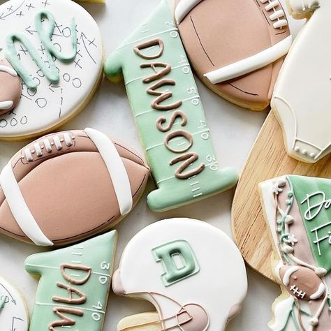 Ashley | Spokane Sugar Cookies on Instagram: "Miiiiiiight have forgotten to post this cute set while it was actually football season. Oh well, better late than never! . . #firstdowncookies #footballcookies #spokane #spokanecookies #customcookies #bradyladybakery   Football, football cookies, Super Bowl, first birthday, decorated sugar cookies, custom sugar cookies" 1st Birthday Football Cookies, Fantasy Football Cookies, First Year Down Football Birthday Cookies, First Down Cookies, First Birthday Football Cookies, First Down Birthday Cookies, First Year Down Cookies, Football Birthday Cookies, Football Decorated Cookies