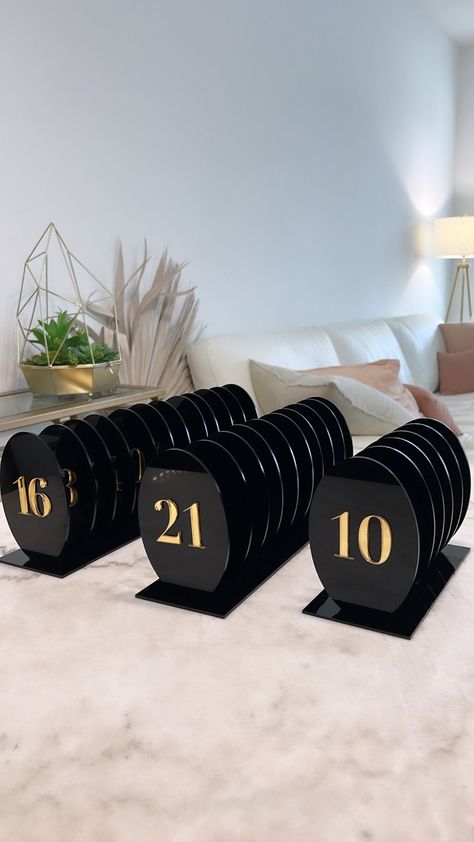 Our arch table numbers are a modern touch to your events decor. These arch table numbers are laser cut from high quality Acrylic. They are custom created to order for your special event in your choice color layers.  Product Size: 6 inches tall 4 inches wide Color Reference in picture  Arch: black Number: Gold Mirror Black And Gold Table Numbers, Black And Gold Table, Table Numbers Acrylic, Gold Table Number, Modern Wedding Centerpieces, Gold Table Numbers, Acrylic Ideas, Acrylic Table Number, Table Place Settings