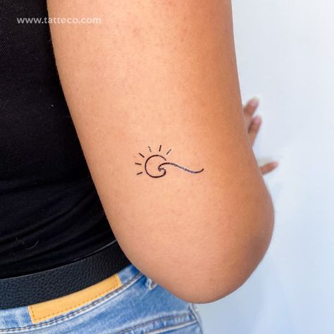 Minimalist wave and sun temporary tattoo. Nº of tattoos 3 Size 1.2 in / 3 cm (width) Out of all the symbols you can tattoo on your body, wave and sun designs are among the few that will be recognized all over the world. Perched at the highest point in the sky, the sun sends down rays that give energy to most living things on the planet. In some cultures, the sun is revered as the one true supreme being that sits at the center of our galaxy and provides the light as well as the heat required for Small Ocean Wave Tattoo, Ocean Wave Tattoos For Women, Sun And Wave Tattoo Simple, Mini Wave Tattoo, Wave Sun Tattoo, Surfer Tattoo Ideas, Minimalist Wave Tattoo, Sun Wave Tattoo, Wave Tattoo Simple