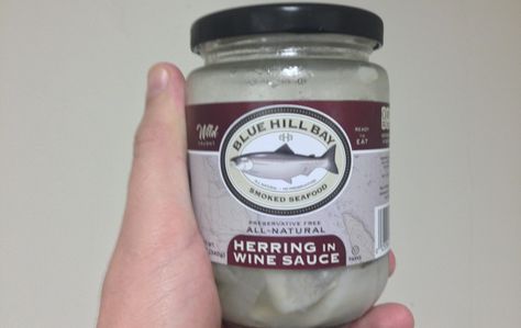 A Review Of This Jar Of Ready-To-Eat Pickled Herring In... Pickled Herring, Wine Sauce, Gatorade Bottle, Eating Well, Drink Bottles, Pickles, Condiments, Sauce, Wine