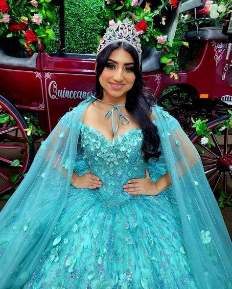 Quinceaneras and Bridals on Instagram: "This color 😍😍😍 . . . https://thequinceshop.com/?s=pr22036 . . . #sage #aqua #teal #quince #dresses #crown #cloak #cape #hood #flowers #glitter #thequinceshop #thatshopwiththecarriage #disneyprincesss #enchanted #forest" Quinceanera Teal Dresses, Teal Quince Dress, Quince Teal Dresses, Teal Quinceanera Theme, Ball Gown With Cape, Aqua Quince Dress, Aqua Marine Quince Dress, Aqua Quinceanera Dresses, Tiffany Blue Quinceanera