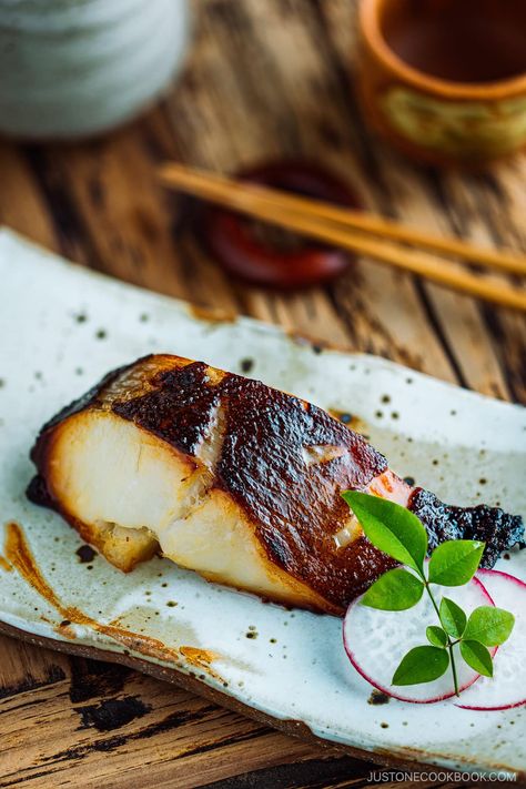 Make Nobu‘s famous Miso Cod at home today! Also known as Black Cod with Miso, this classic Japanese seafood dish is delicate, buttery, and melt-in-your-mouth delicious. You‘ll be surprised by how easy it is to pull this off at home. Miso Cod Recipe Nobu, Miso Black Cod Recipe, Miso Cod Recipe, Miso Cod, Japanese Seafood, Cod Recipe, Black Cod, Cod Recipes, Seafood Dishes