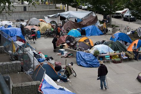 A homeless camp of last resort pops up on the county campus Dozens of people live in tents on a patch of concrete in downtown Everett. The county does what it can to help.  By Rachel Riley Monday, June 29, 2020 5:54am  Herald Net Homeless Aesthetic, Homeless Shelters, Tent Community, Portable Homeless Shelter Ideas, Homeless Shelter Volunteer, Bad Genius, Urban Camping, Homeless Tent City, Tiny House Village