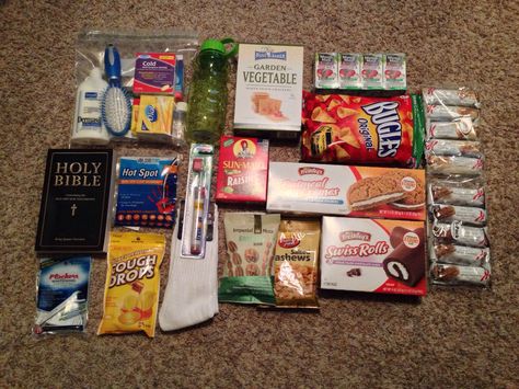 Make homeless care packages for the less fortunate this year. Here's a list of the items I put in my care packages: Holy Bible, granola bars, crackers, nuts, raisins, chips, cookies, deodorant, chapstick, hand sanitizer, bar soap, toothbrush, toothpaste, floss, waterproof bandaids, hair brush, lotion, hand warmers, socks, hats, gloves, and a water bottle. All of the items shown I got at the dollar store. I also bought a back pack at a thrift shop for $2 to put all the supplies in. Homeless Bags, Homeless Care Package, Blessing Bags, Toothbrush Toothpaste, Service Projects, Care Packages, Thrift Shop, Helping The Homeless, Granola Bars