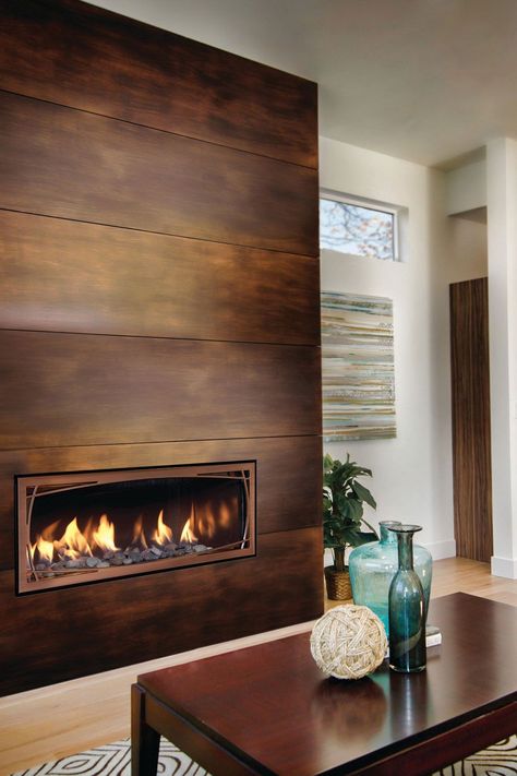 Light Tone Wood Floor With Modern Wood Fireplace Fireplace With Metal Surround, Entryway Fireplace Ideas, Metal Fireplace Wall, Adhesive Fireplace Tile, Office Fireplace Ideas, Casual Family Room Design, Scandinavian Living Room Fireplace, Tile Fireplace Floor To Ceiling, Fireplace Trends For 2023