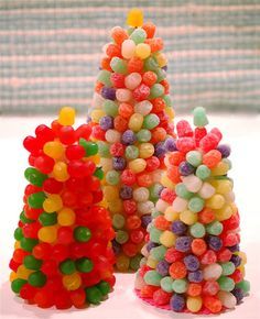 good idea - gumdrop tree. Sweets stuck to polystyrene cone with halved cocktail sticks. Nice alternative to a gingerbread house. This site has a lovely Christmas countdown with books and activities paired for each day. Candy Tree, Party Food Buffet, Paper Wall Hanging, Cool Paper Crafts, Christmas Tree Crafts, Birthday Party Food, Navidad Diy, Diy Garland, Fiesta Party