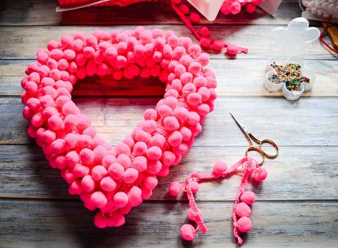 Pom Pom Wrapped Heart Wreath Heart Pompom Diy, Pom Pom Heart Wreath, Valentines Sewing, Heart Wreath Form, Valentines Yarn Wreath, Heart Shaped Pom Pom Wreath, Valentine Goodies, Valentine Yarn And Ribbon Wreath, Diy Pom Pom