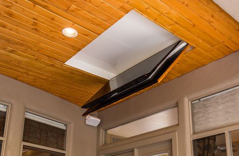 Folding Ceiling TV Mount | Cool Patio Flip Down TV Outside - Nexus 21 Tv Outside Patio Outdoor Tv Cabinet, Tv Mount Outside Patio, Pull Down Tv Mount Ceiling, Hidden Ceiling Tv, Under Deck Tv Ideas, Flip Down Ceiling Tv Mount, Retractable Tv Ceiling, Fold Up Tv Mount, Fold Down Tv Ceiling