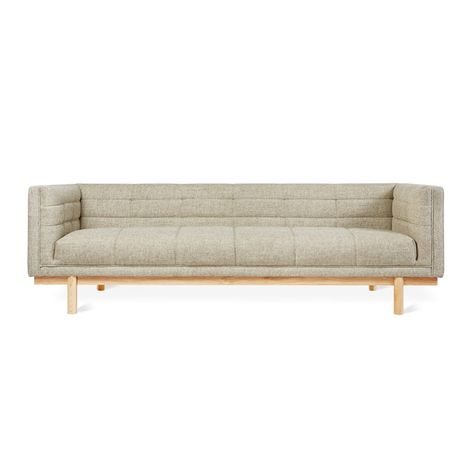 Drawing inspiration from both mid-century and contemporary influences, the Mulholland Sofa is a tailored design with distinctive tufting on the seat, arms and back that creates subtle character and an attractive, modern aesthetic. With no cushions to adjust, the tuxedo-style frame creates an enveloping space where ever Modern Tuxedo, Upholstery Foam, Table Cafe, Gus Modern, Cushion Seat, Tailored Design, Modern Furniture Living Room, Toss Pillows, Modern Fabric