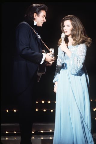 JOHNNY CASH AND JUNE CARTER RETURNED TO THE GRAND OLE OPRY STAGE WHERE THEY MET TO PERFORM TOGETHER IN 1970L ABC PHOTO ARCHIVESGETTY IMAGES June And Johnny Cash, John Cash, Johnny Cash June Carter, June Carter, June Carter Cash, Johnny And June, Carter Family, Beyonce And Jay Z, Beyonce And Jay