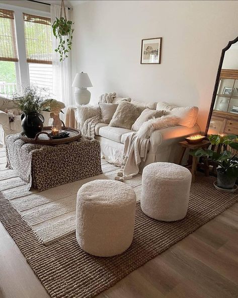 35 Beautiful Ottoman Decor Ideas You Should Try Living Room With Ottoman Layout, How To Decorate An Ottoman, Ottoman Decor Ideas, Living Room Ottoman Ideas, Ottoman Coffee Table Decor, Round Ottoman Coffee Table, Brown Leather Ottoman, Blue Ottoman, White Ottoman